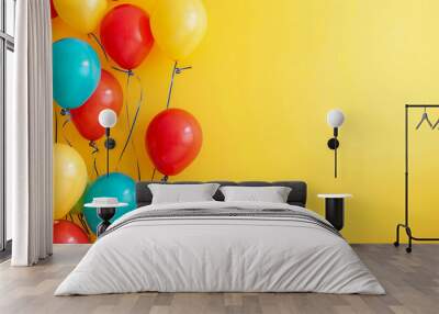 Colorful Balloons Against Yellow Background Wall mural