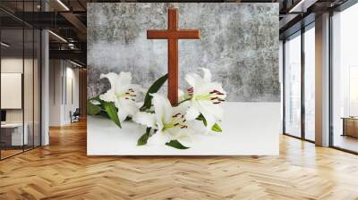 Cross with lilies isolated on grey background Easter, baptism card. Wall mural