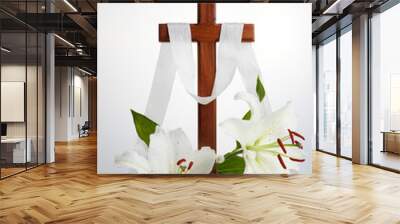 Cross with lilies on white background. Spring background. Easter, baptism or first communion concept Wall mural