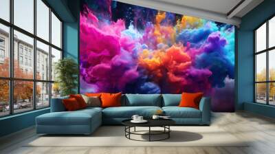 Explosion of colored powder isolated on black background. Wall mural