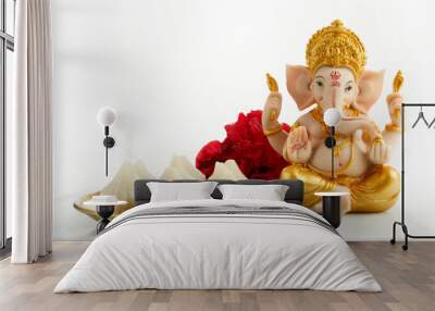 idol of lord ganesha with modak sweet dish and flower. ganesh chaturthi Wall mural