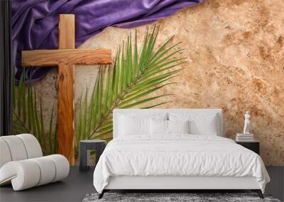 Lent season, Holy week and Good friday concept. Palm leave and cross on stone background Wall mural