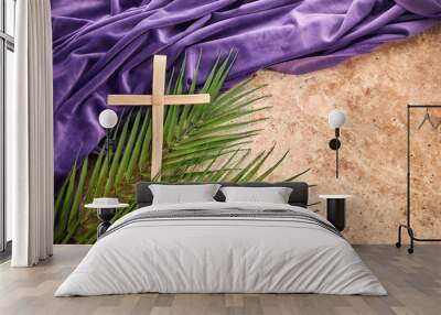 Lent season, Holy week and Good friday concept. Palm leave and cross on stone background Wall mural