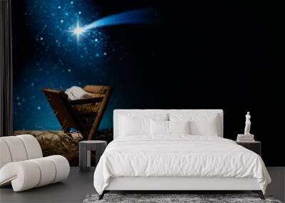 Nativity of Jesus, empty manger at night with bright lights. Wall mural