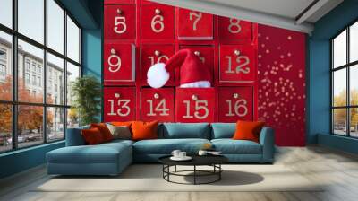 Red wooden Advent calendar with surprise for Christmas Wall mural