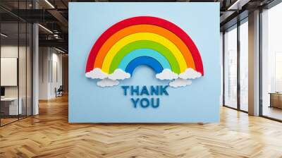 Thank you rainbow banner. Rainbow ob blue background with letters Wall mural