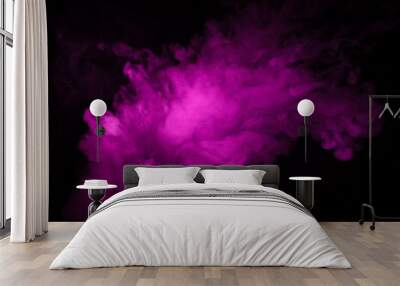 Colorful smoke close-up on a black background. Blurred pink cloud of smoke. Wall mural