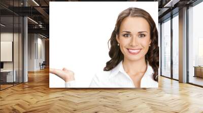 Businesswoman showing, isolated on white Wall mural