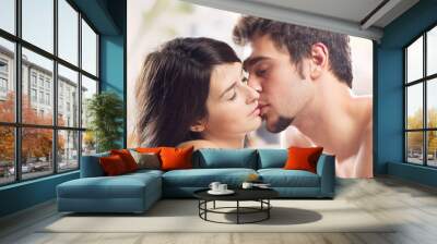 Couple making love in bed Wall mural