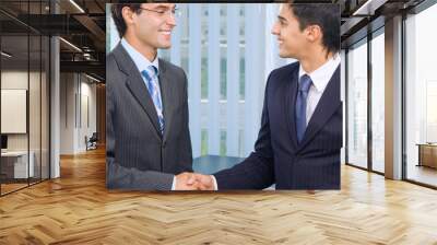 happy businesspeople handshaking Wall mural