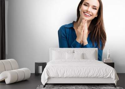 happy gesturing smiling young woman, isolated Wall mural