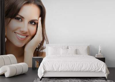 Portrait of beautiful woman, on grey Wall mural