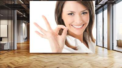 portrait of happy smiling businesswoman with okay gesture Wall mural