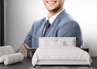 Portrait of happy smiling handsome businessman in grey confident suit, isolated on white background. Business success concept. Wall mural