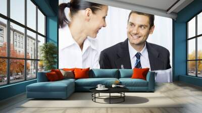 two businesspeople or client and businessman, giving pen Wall mural