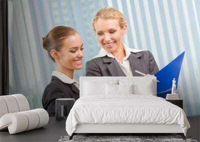 two businesswomen working together at office Wall mural