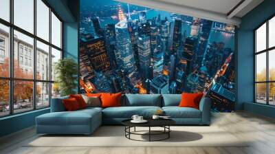 Aerial view of dense urban cityscape at night Wall mural