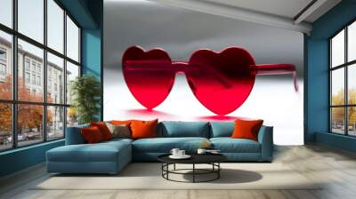 Red heart shaped sunglasses on light background, closeup Wall mural