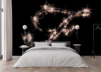 the letter f made from sparks of Bengal lights isolated on a black background. Wall mural