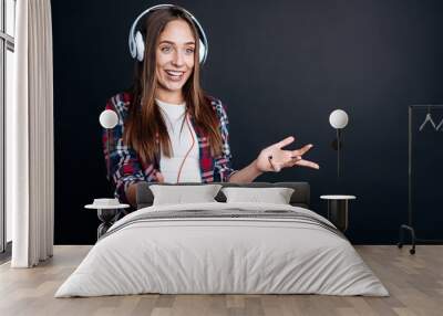 cheerful smiling girl playing video games Wall mural