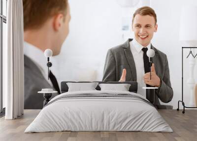 Man looking in mirror and pointing on himself  Wall mural