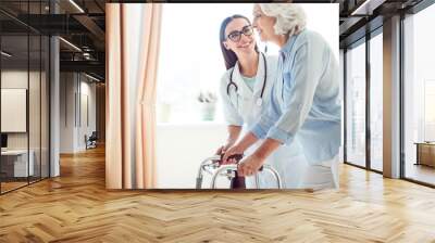 Nice doctor with disabled woman Wall mural