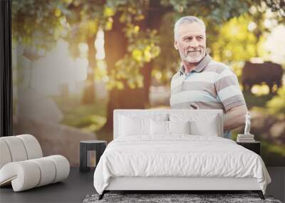 Sporty aged man smiling Wall mural