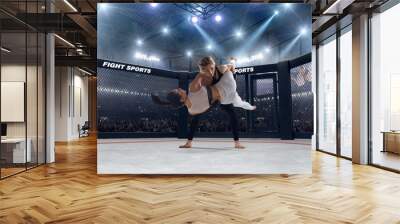 MMA female fighters on professional ring. Wall mural