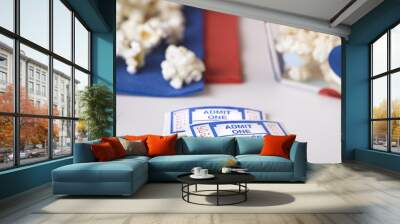 Popcorn bowl with movie tickets.. Wall mural