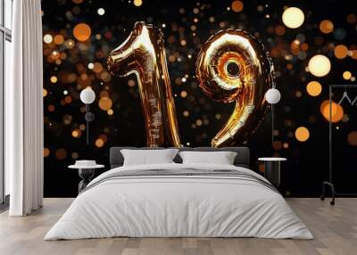 A festive scene featuring two shiny golden foil balloons shaped the number 19 against a bright black background.  Wall mural