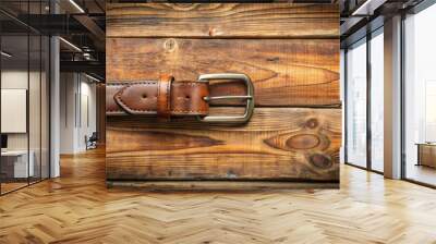 Belt with buckle on rustic wooden background texture with copy space for text Wall mural