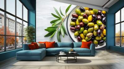 Top view of black and green olives on a plate Wall mural