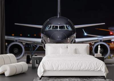 Detailed night refueling of widebody passenger aircraft at airport. Wall mural