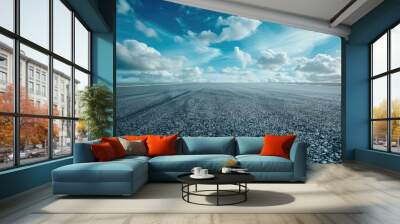 Empty asphalt race track ground and beautiful sky clouds Wall mural