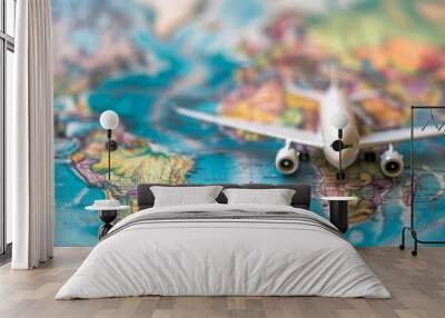 A white airplane is on a map of the world Wall mural