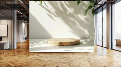 Minimalistic wooden surface with soft shadows cast by leaves on a light neutral background Wall mural