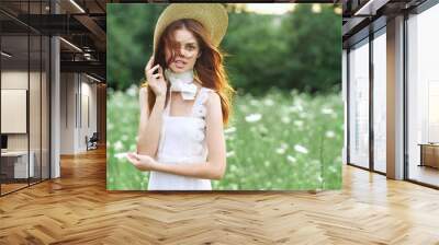 pretty woman in hat walk nature posing fashion Wall mural