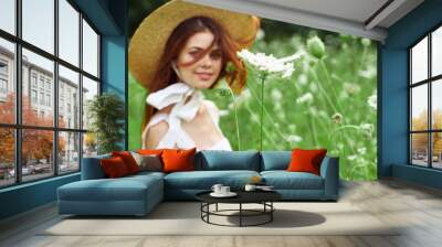 Woman with hat white dress flowers nature relaxation Wall mural