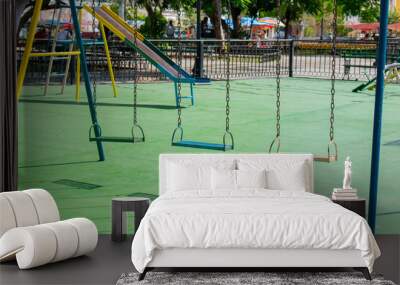 Playground in the park. Swings. Wall mural