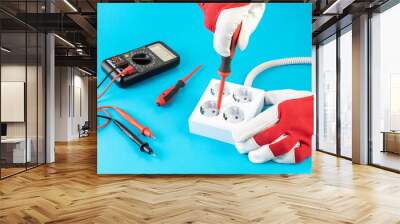 assembly of a block of four electrical outlets Wall mural