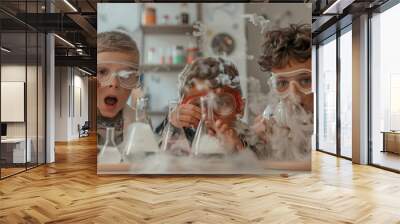 Three excited children, wearing safety goggles, engage in a fun science experiment with beakers and dry ice in a lively classroom. Wall mural