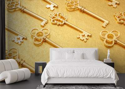 Secret wealth and the key to success concept with pattern of many ornate gold skeleton keys isolated on golden background Wall mural