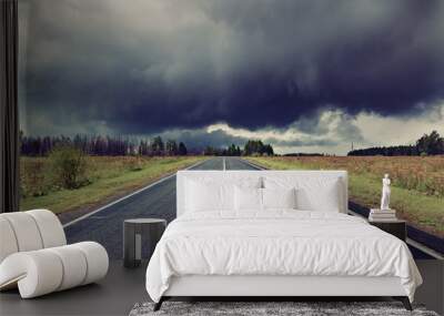 road and dark thunder clouds Wall mural