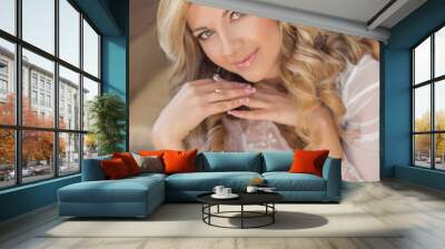 Beautiful smiling bride woman indoor portrait. Makeup and wavy h Wall mural