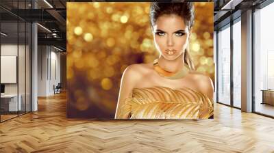 fashion beauty girl isolated on golden bokeh background. makeup. Wall mural