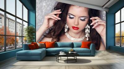 fashion portrait of beautiful woman with perfect make up over pa Wall mural