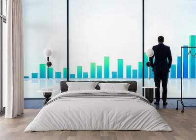 Businessman observing financial growth bar chart on large screen in modern office with bright light, focused and contemplative Wall mural