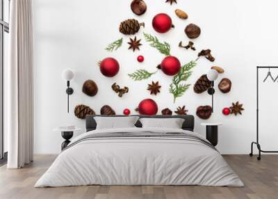 Christmas tree made from decorations on white background. holiday and celebration creative concept. New Year and Christmas postcard or invitation. Flat lay Wall mural