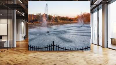 Fountains in the public park in residential area Wall mural