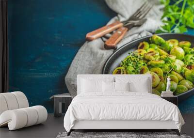 Black plate with delicious roasted Brussels sprouts Wall mural